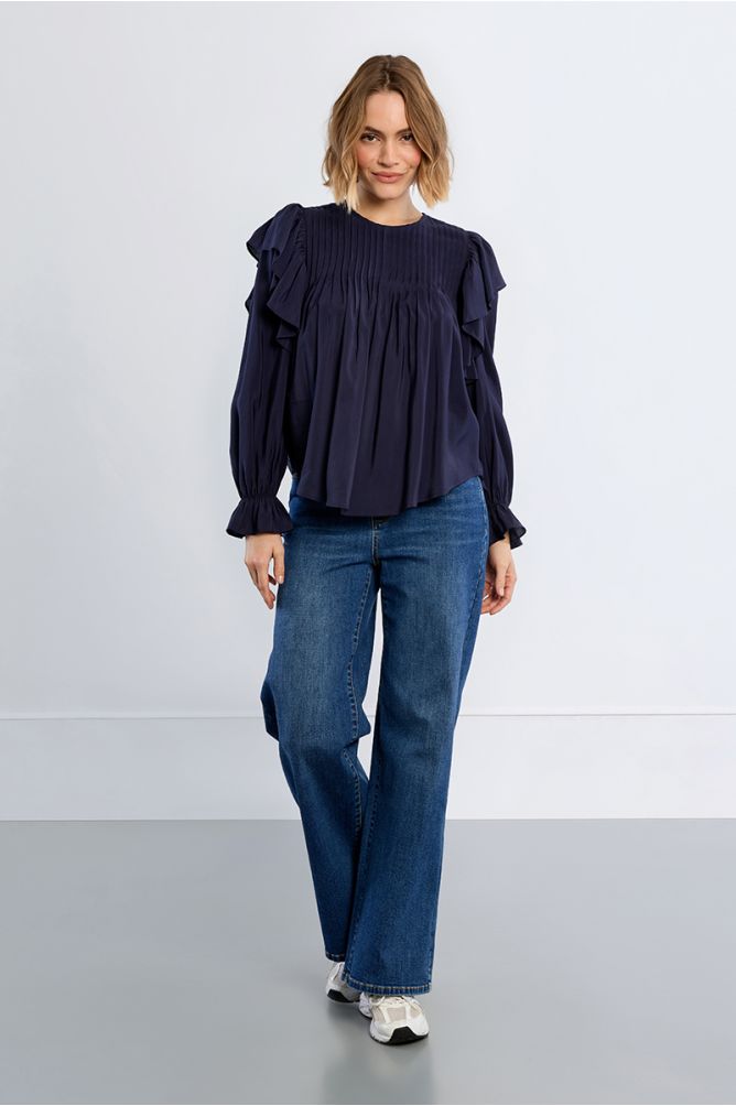 Blusa de manga larga con volantes
