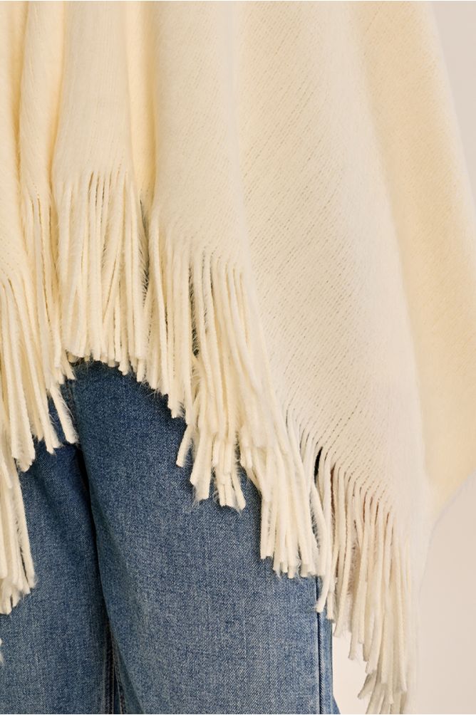 Fringed poncho, brushed knit