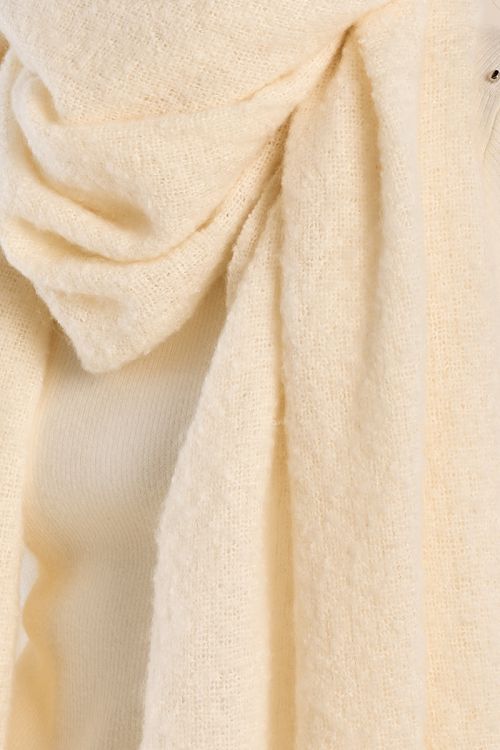 Knitted scarf, fringed