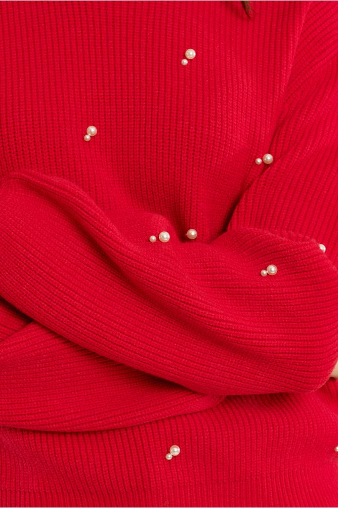 Knitted sweater, with beads