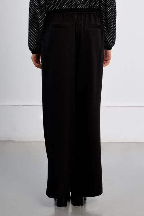 Pantalón largo perneras anchas