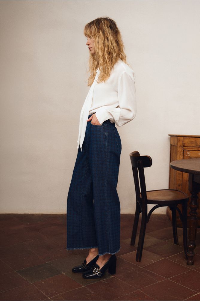 Pantalón vaquero con estampado
