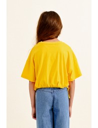 Camiseta de niña de manga corta, con lazadas en el bajo 