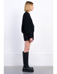 Oversized knit sweater with fancy buttons