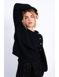 Oversized knit sweater with fancy buttons