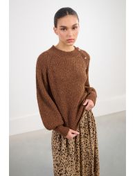 Oversized knit sweater with fancy buttons