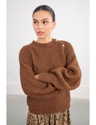 Oversized knit sweater with fancy buttons