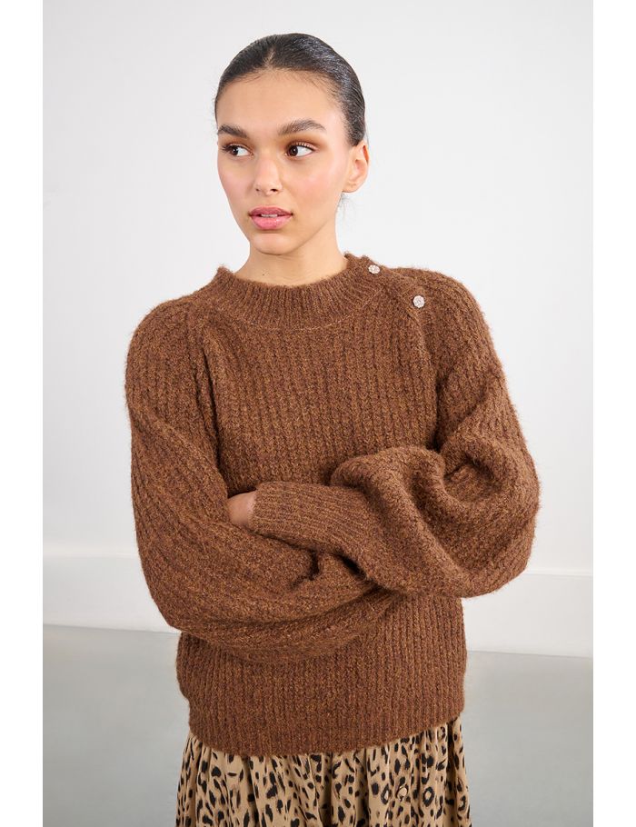 Oversized knit sweater with fancy buttons