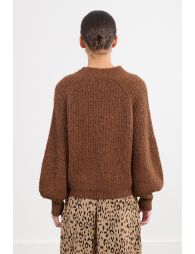 Oversized knit sweater with fancy buttons