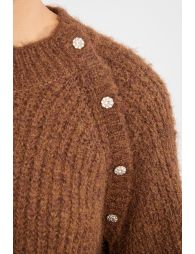 Oversized knit sweater with fancy buttons
