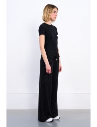 Jogger pants studded with rhinestones