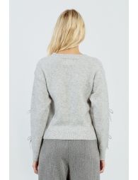 Embossed bow sweater
