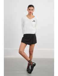 Jerseyde manga larga abullonada estampado lazo