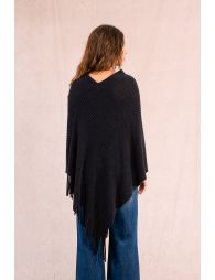 Double-breasted poncho with fringes