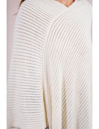 Double-breasted poncho with fringes
