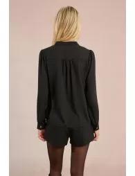 Camisade manga larga detalle volantes