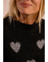 Knitted sweater with heart pattern