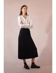 Jupe mi-longue en maille plissée