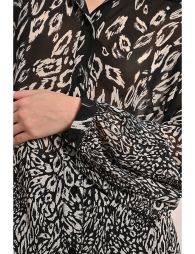 Blusade manga abullonada con estampado y lazada