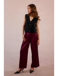 Sleeveless knit cardigan studded with sequins