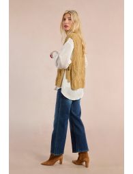 Sleeveless sweater to tie at the sides
