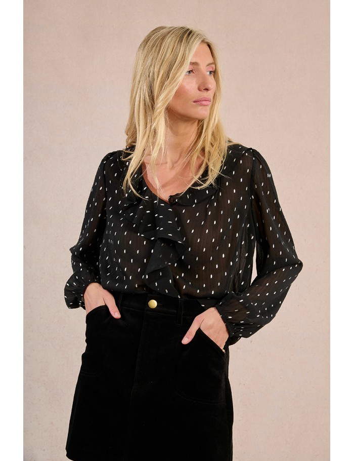 Blouse à pois et à volant