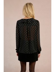 Blouse à pois et à volant
