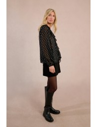 Blouse à pois et à volant