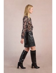 Short asymmetrical skirt in faux leather