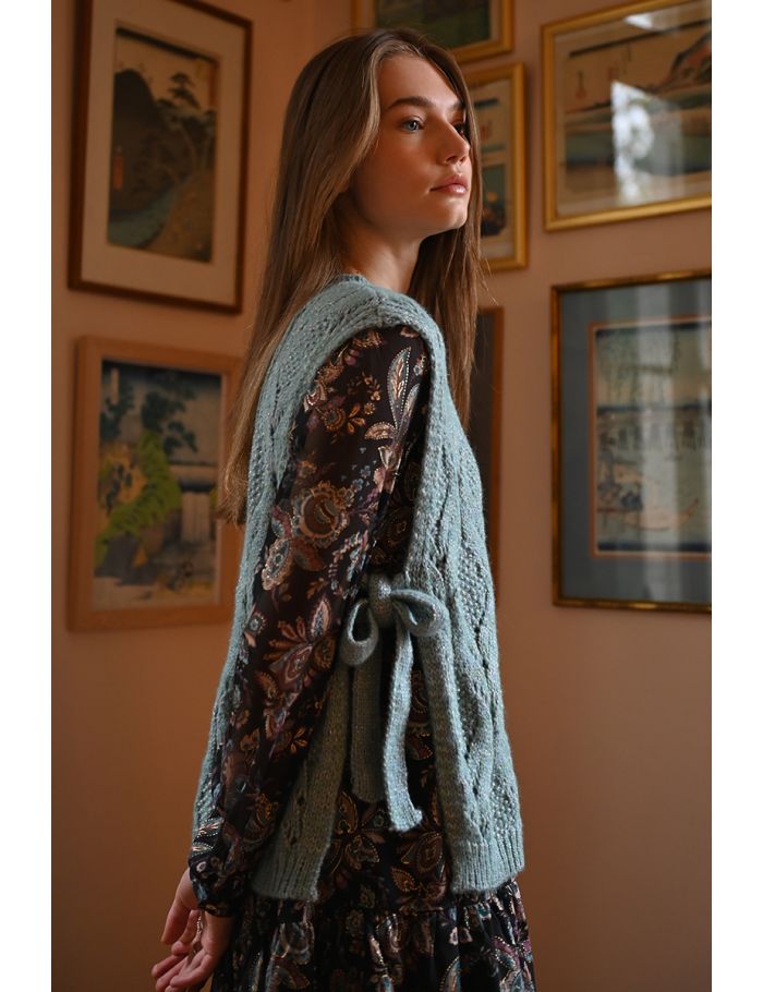 Pull sans manches à nouer sur les côtés