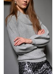 Knitted sweater studded with sequins