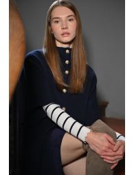 Knitted cape, buttoned