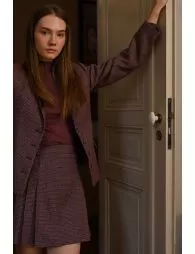 Jupe courte à plis