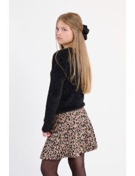 Falda corta, elástica, con estampado animal.