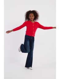 Pantalón de niña vaquero, con perneras anchas.