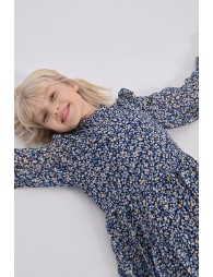 Vestido de niña de manga larga, con estampado y volantes.
