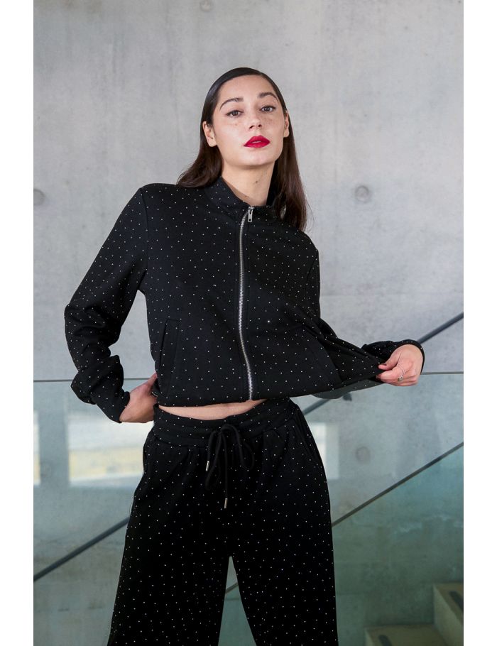 Bomber jacket studded with rhinestones