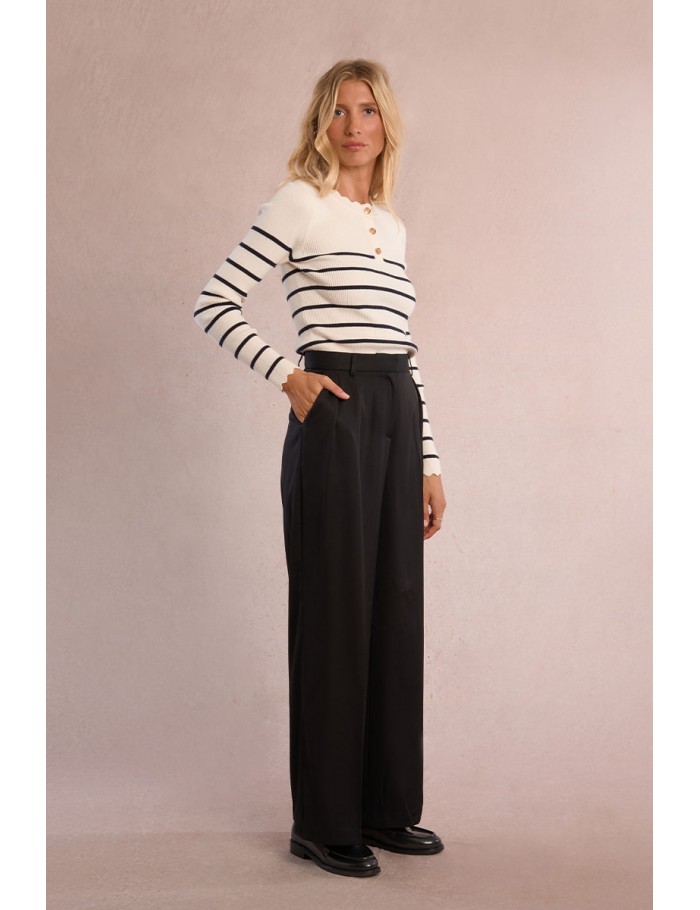 Pantalón  largo perneras anchas