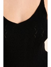 Top de mujer sin manga, en punto calado.