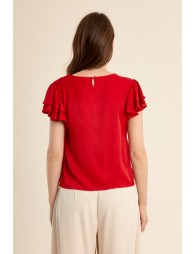 Camiseta de manga corta, con volantes.