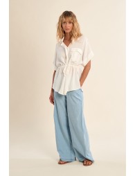 Safari blouse, knotted at the waist