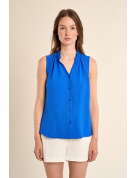 Camisa de manga sisa, detalle volantes.