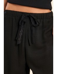 Pantalón de mujer largo, con lazada.