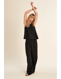 Top de mujer sin manga, de corte amplio.