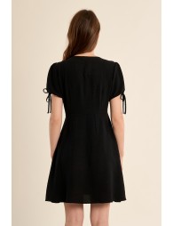 Short dress with knotted sleeves