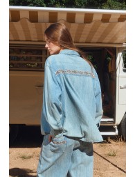 Denim shirt with bead detailing.