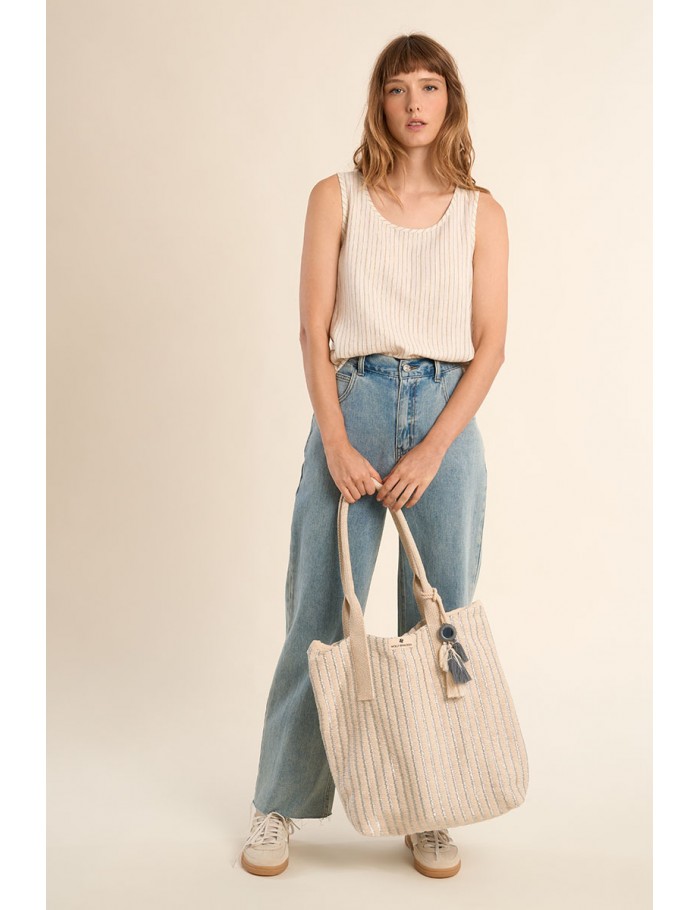 Bolso de mujer de tela, con estampado y borlas.