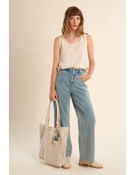 Bolso de mujer de tela, con estampado y borlas.