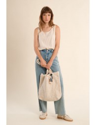 Bolso de mujer de tela, con estampado y borlas.