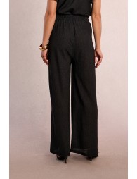 Straight, flowing trousers in semi-sheer
